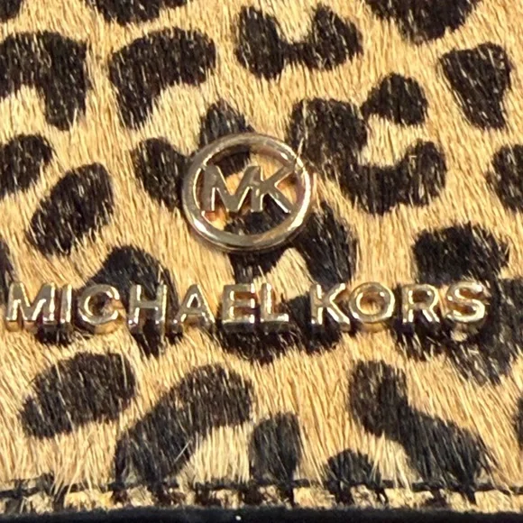Michael Kors Animal Print and Black Clutch - Picture 11 of 16